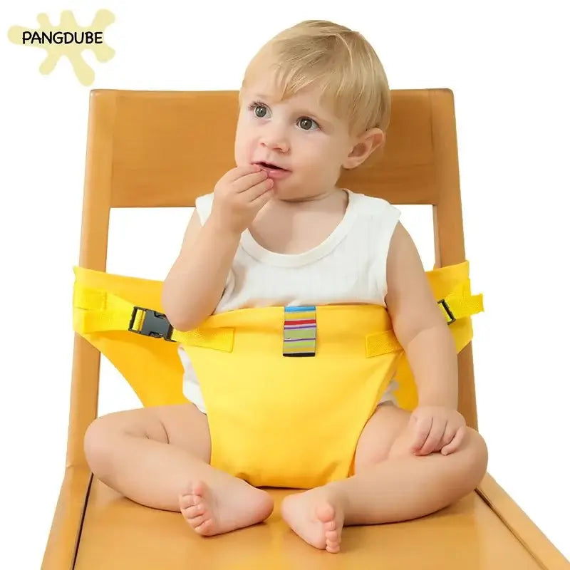 Toddler using PANGDUBE Child Seat Harness on a chair, showcasing portable and safe dining solution for babies.